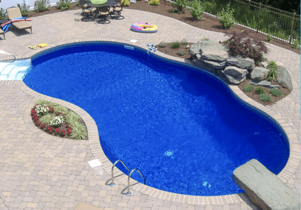 Vinyl inground pool with concrete decking